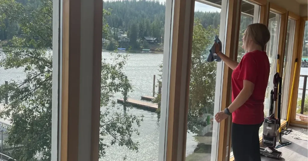 home cleaning team wiping the windows in liberty lake WA